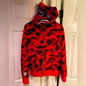 Bape red sharkhead jacket 
Tagged XL fit like a M
